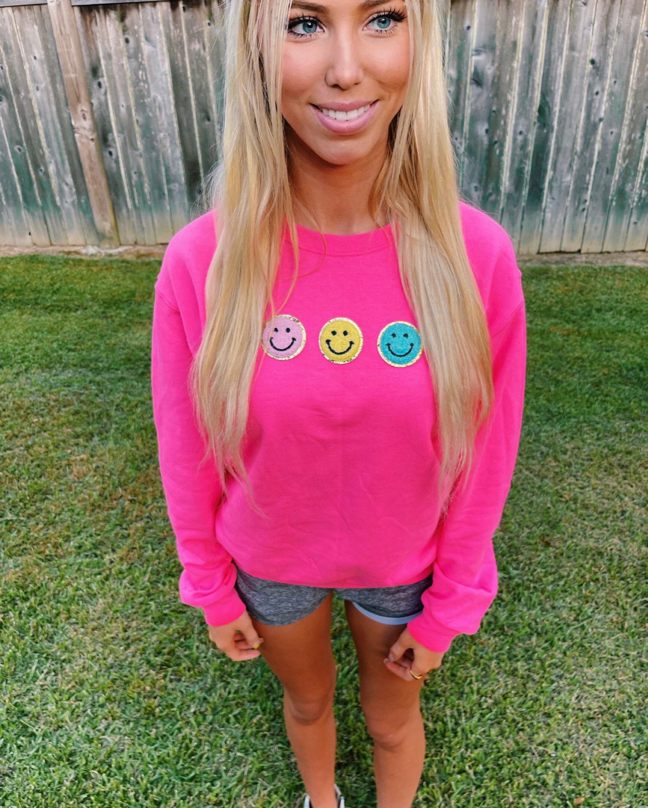 smiley face patch sweatshirt